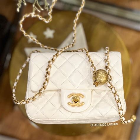 chanel small gold bag|chanel bag with gold chain.